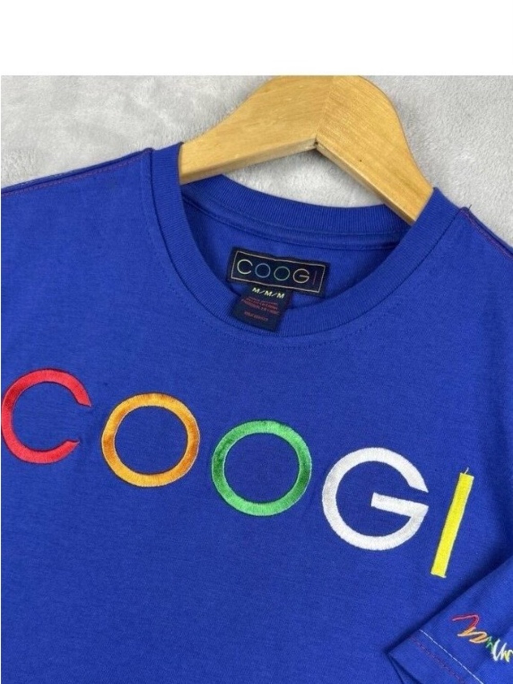 COOGI woman’s  Royal Blue Embroidered Logo Sweatshirt